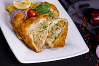 Pork chop fried in breadcrumbs and stuffed with goose liver - 